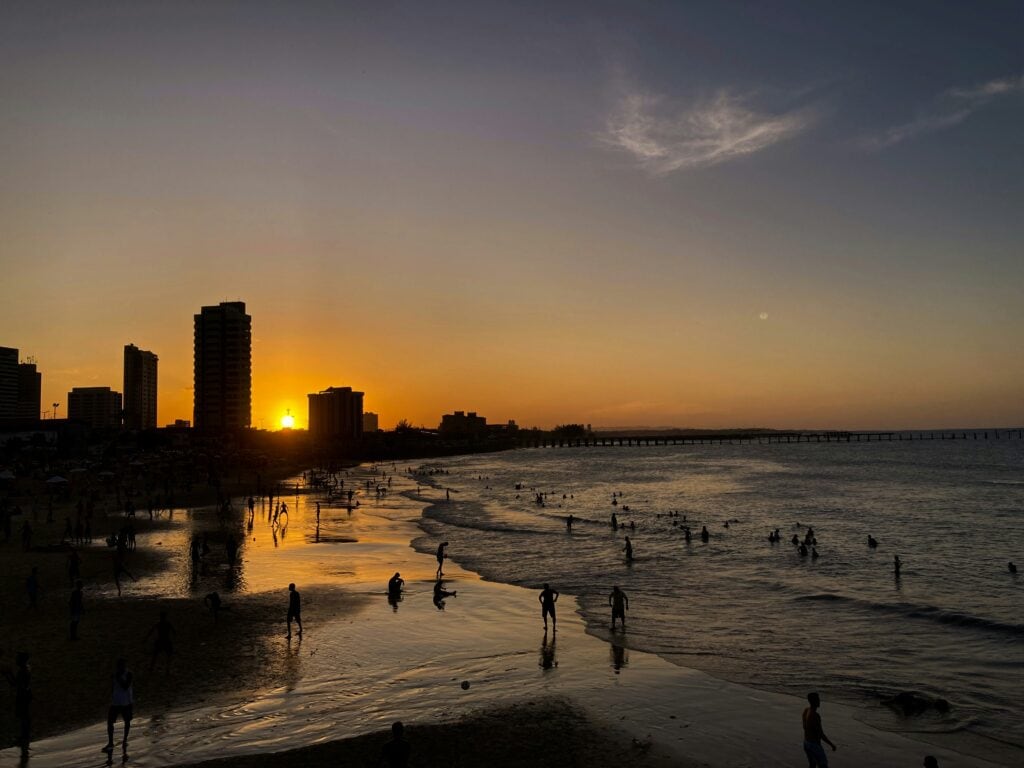 Sunset view of the beach, ocean and some residential blocks of flats in Fortaleza, Brazil
