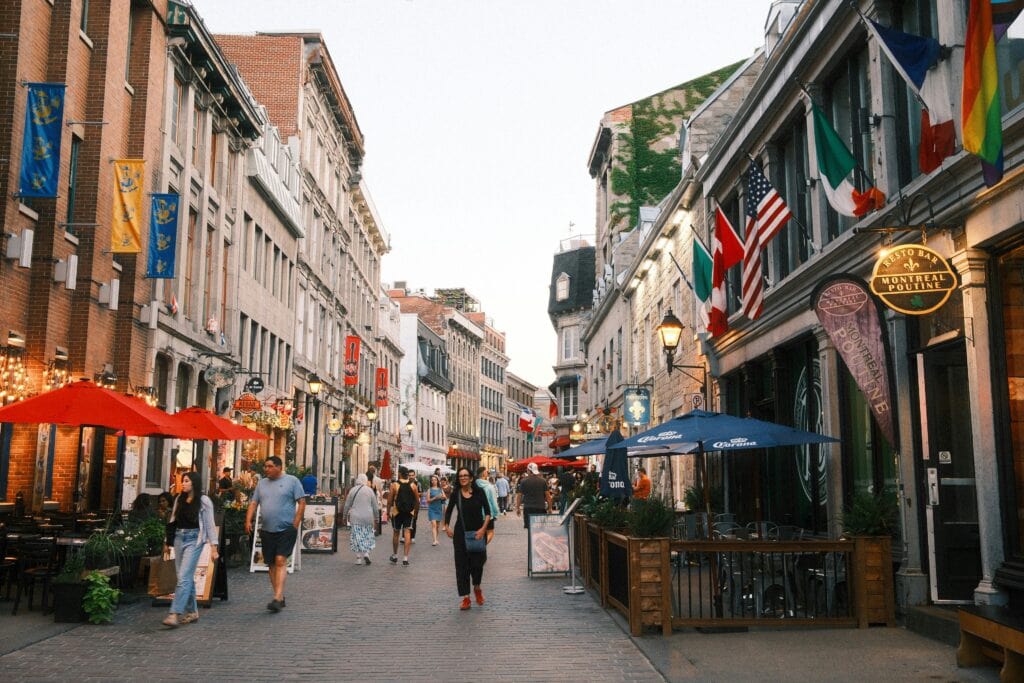 Cute shopping street in the city center of a Canadian city, lined by bars and restaurants on each side in historical buildings