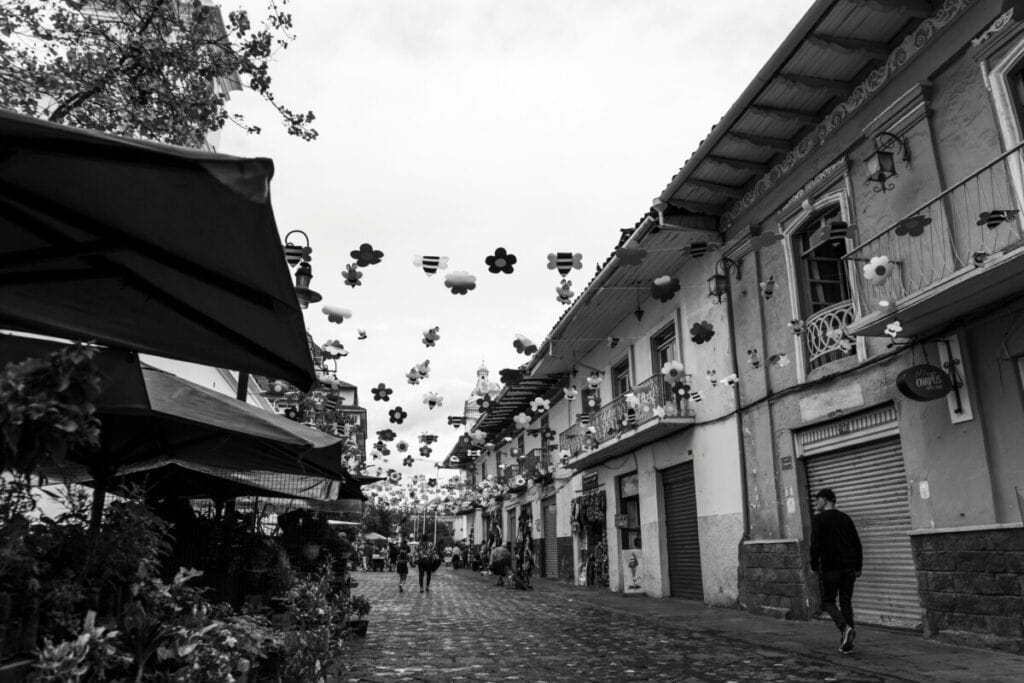 Black-and-white photo of street in Cuenca, Ecuador