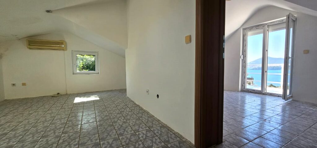 Living room and bedroom area of apartment in Montenegro