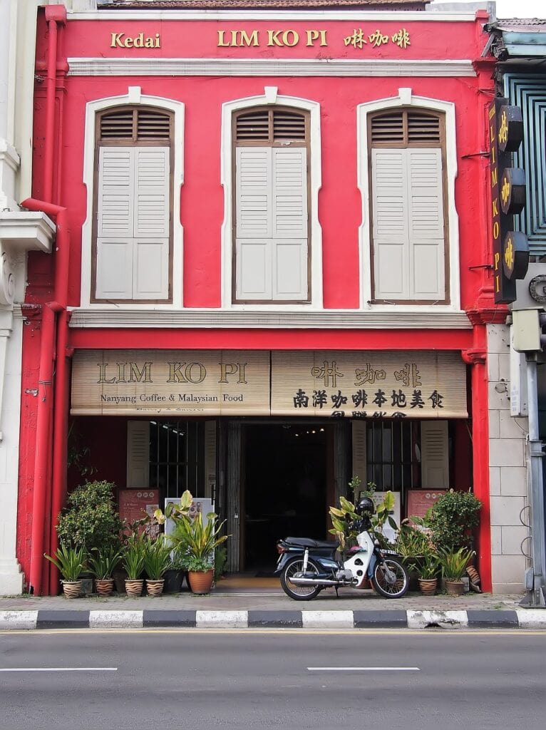 Traditional building in Malaysia with restaurant and apartments