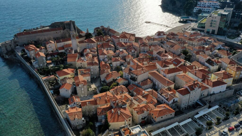 Aerial view of beautiful town next to the sea in Montenegro