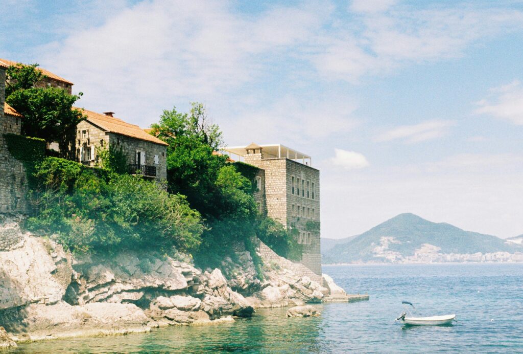 Stone houses overlooking the sea in Sveti Stefan, Budva, Montenegro