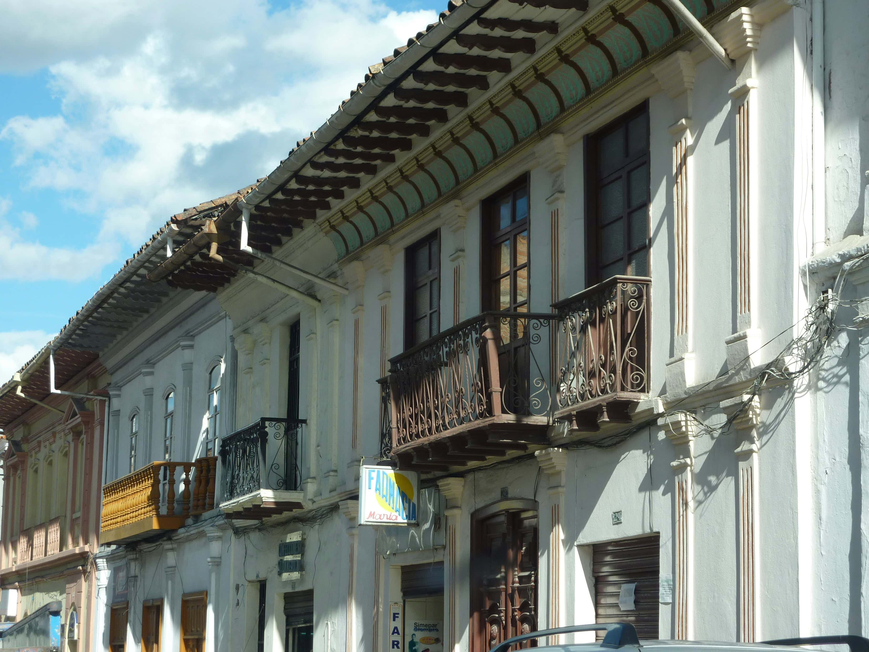 Low apartment buildings with balconies in Cuenca, Ecuador.
